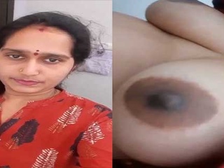 Village wife with big boobs and hairy pussy gets naughty in the bathroom