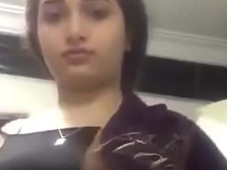 Naughty wife flaunts her big tits in public restroom